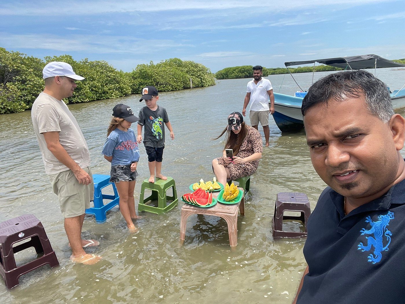 Fruit picnic in the shallow mangrove lagoon waters
